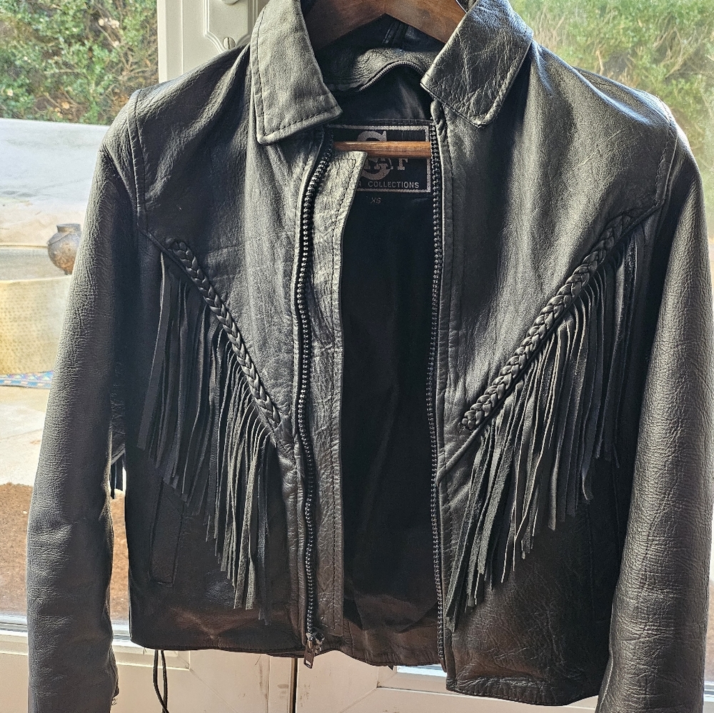 Vintage black leather fringe motorcycle jacket